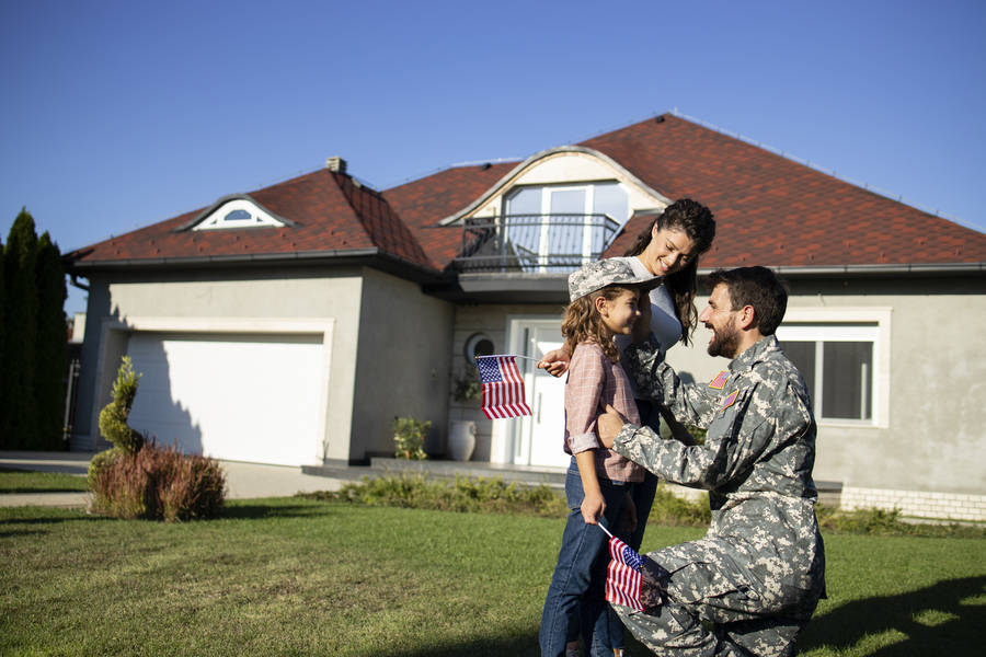 soldier in military uniform talking to his daughter and wife after long time